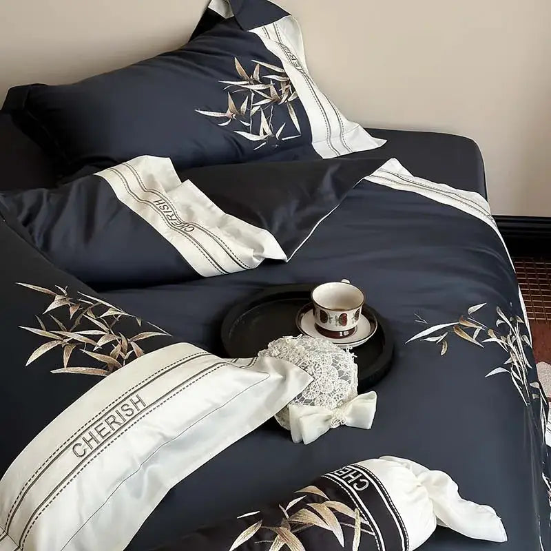 Luxury dark blue bamboo embroidery bedding set in 1000tc Egyptian cotton with gold leaf and cherish stitching details