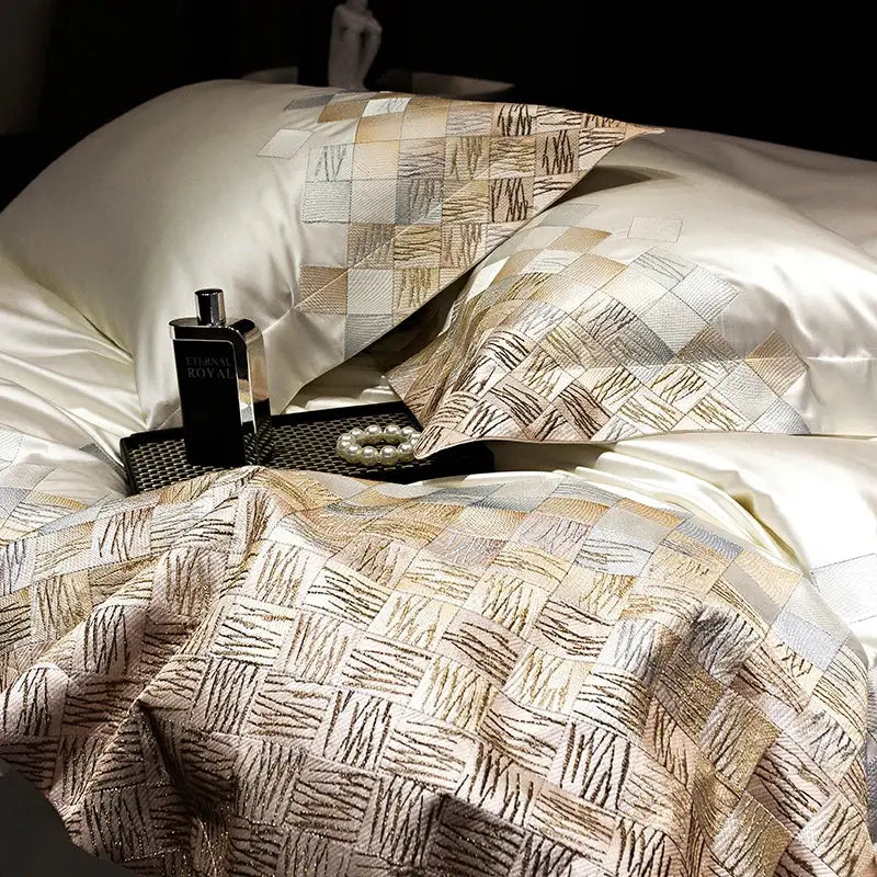 Luxury embroidery bedding set in pearl white and grey featuring beige and silver geometric satin bedspread with woven texture