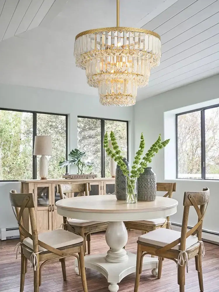 Luxury gold and amber crystal round pendant lights feature a multi-tiered decorbites crystal round pendant with clear prisms