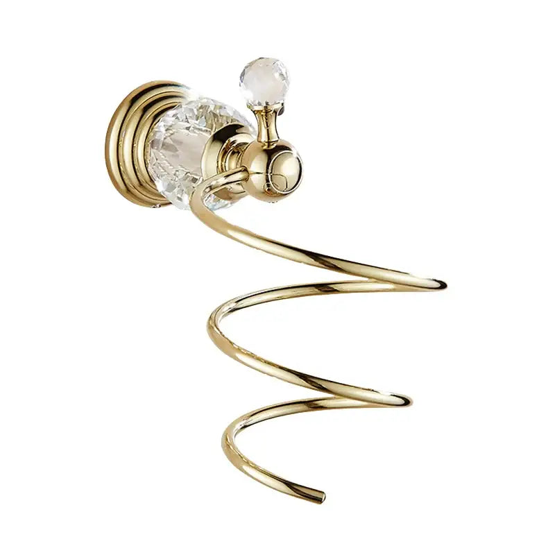 Gold-toned towel ring with crystal-encrusted wall mount and spiral design in luxury gold and crystal bath hardware set