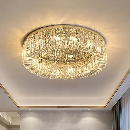 Luxury gold crystal glass round ceiling light with faceted decorbites crystal glass tiers emitting warm light
