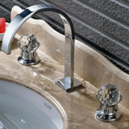 Chrome-finished basin faucet with arched spout and decorbites crystal handle gold knobs for luxury bathroom use