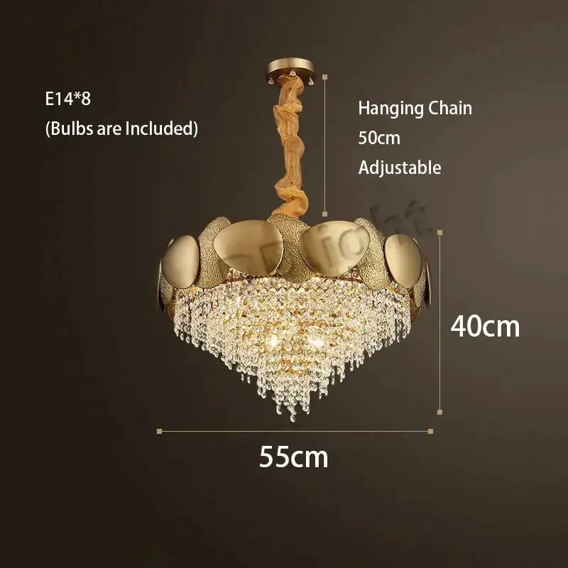 Gold-toned decorbites lizzie ceiling chandelier with eight e14 led bulbs and crystal tassel accents in an ornate frame