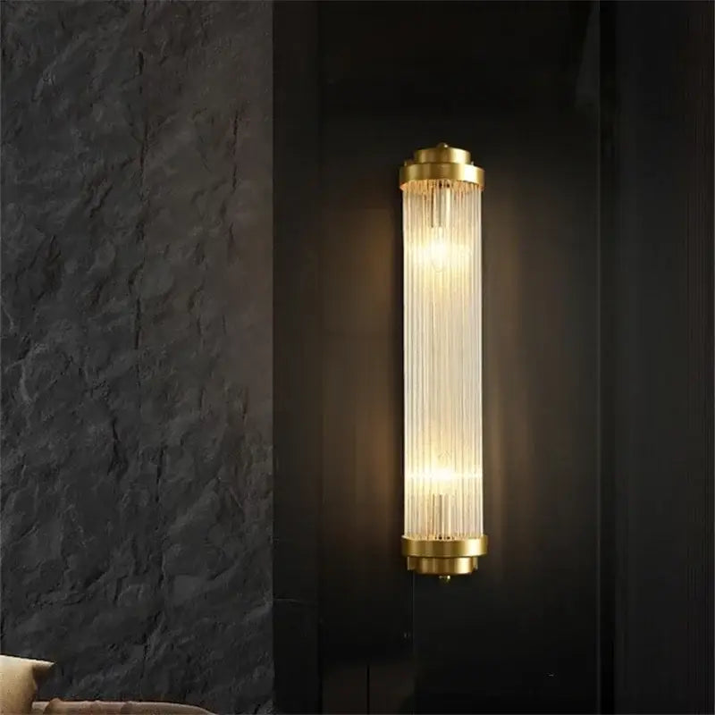 Luxury gold crystal led wall sconce featuring vertical glass prisms for elegant bedroom lighting with led wall design