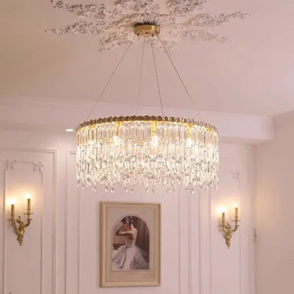 Luxury gold crystal pendant chandelier with a gold-toned frame and hanging glass prisms for living room decorbites crystal pendant