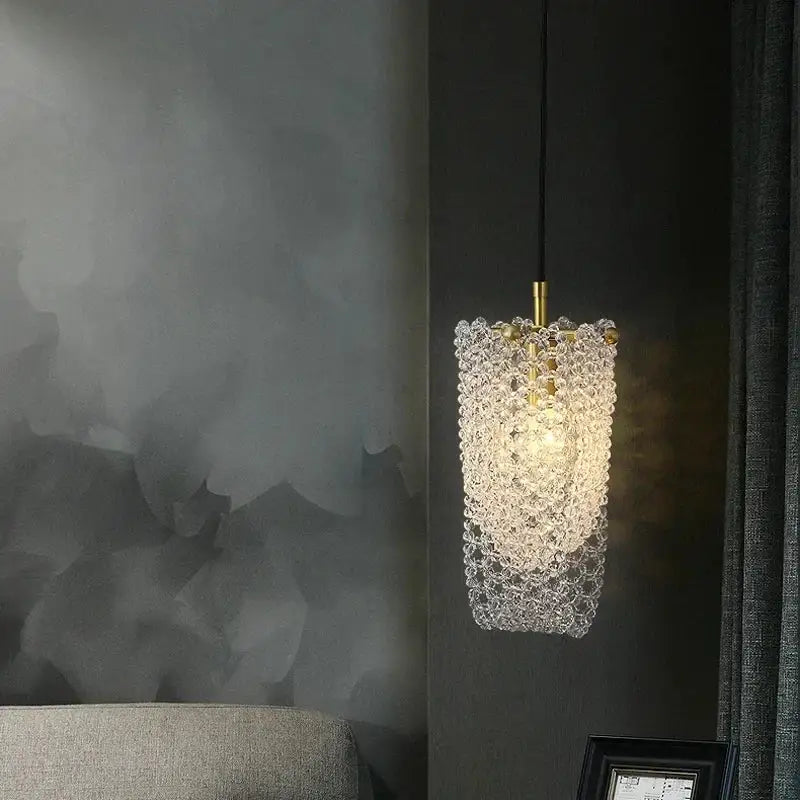 Luxury gold crystal tassel pendant with golden metal fixture and cascading clear crystal beads for dining room lighting