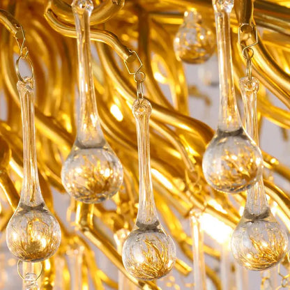 Luxury gold crystal tree branch chandelier with clear glass teardrop pendants and intricate gold-toned metalwork for living room decorbites crystal tree