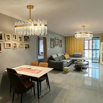 Luxury gold decorbites crystal chandeliers with cascading crystal prisms for elegant dining room lighting