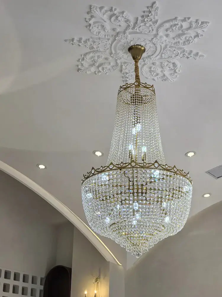 Luxury gold multi tier crystal led chandelier with decorbites crystal led design hanging from ornate ceiling medallion