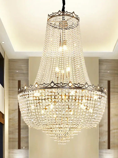 Luxury gold multi tier crystal led chandelier with ornate metallic frame and cascading clear crystals by decorbites crystal led