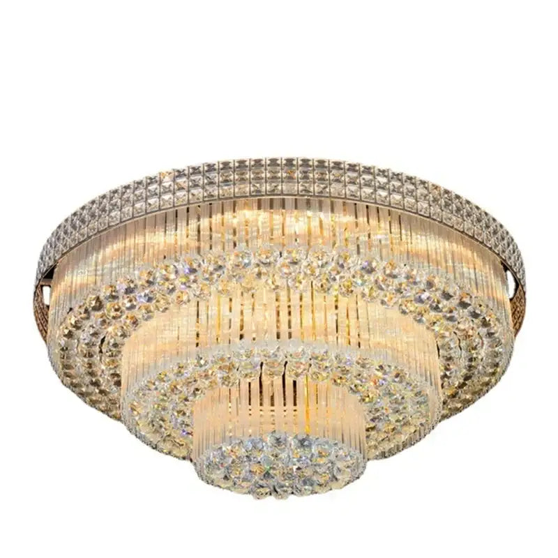 Luxury gold multi-tiered crystal led chandelier with clear faceted crystals creating a warm glow for living room
