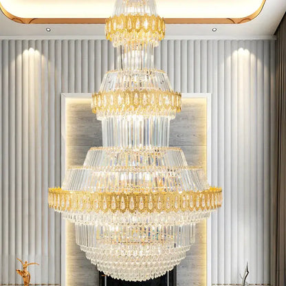 Luxury gold multi-tiered decorbites crystal chandelier with cascading clear glass prisms for living room decor