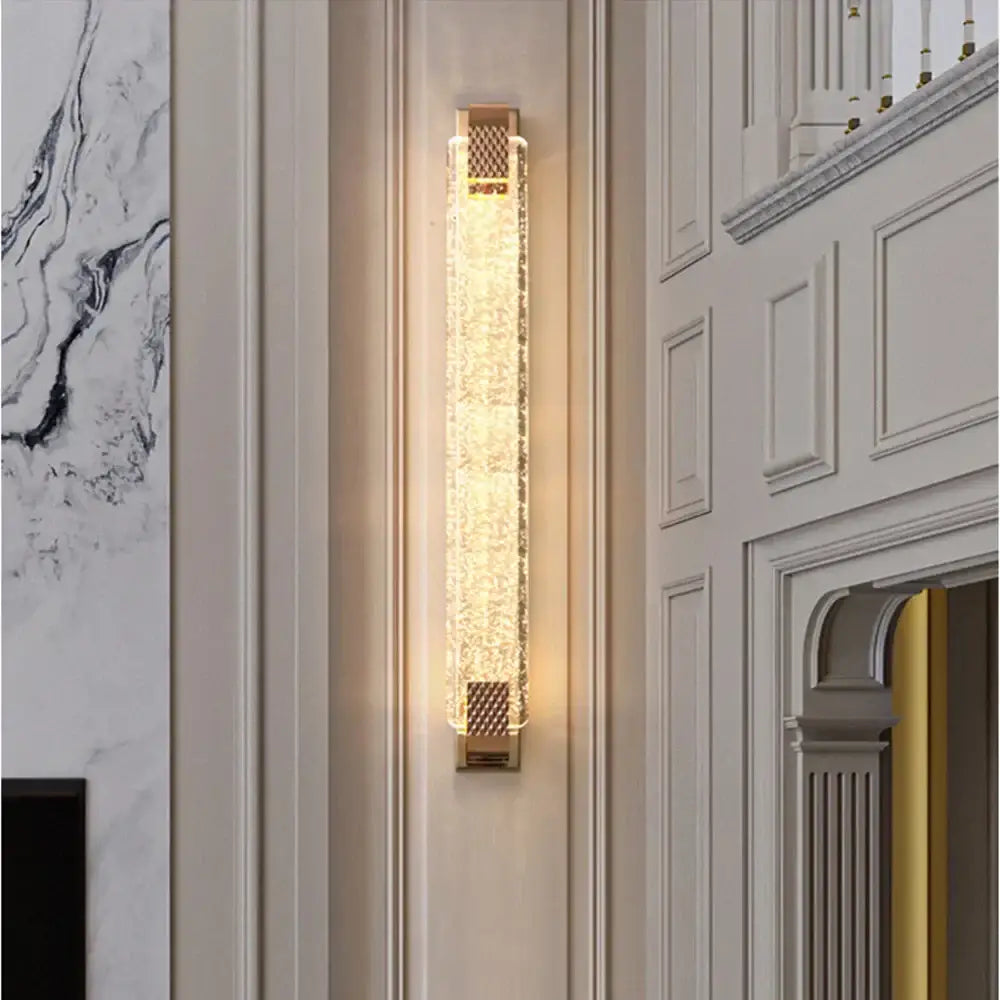Luxury gold rectangular decorbites crystal wall lamp with textured illuminated panel and decorative mesh accents for bedroom decor