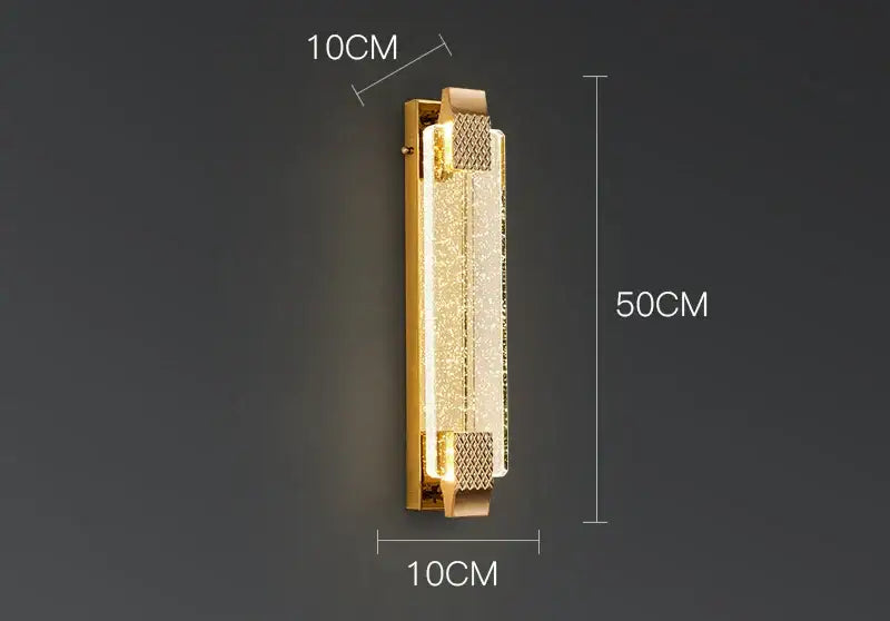 Luxury gold rectangular crystal wall lamp with textured sparkling panel and metallic mesh accents for bedroom decorbites wall lamp