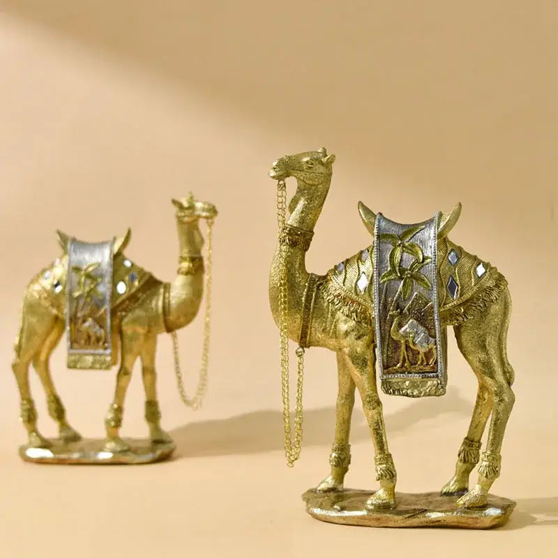 Luxury gold and silver camel resin art ornament with intricate silver and mirrored saddle embellishments for living room decor