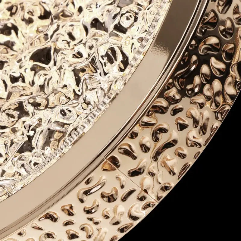 Gold-toned luxury decorbites crystal ring pendant light with textured embossed tray for bedroom decor