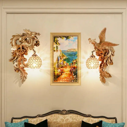 Luxury golden dragon phoenix wall light with intricate golden dragon phoenix design and spherical meshed glass shades decorbites dragon phoenix
