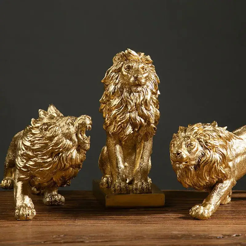 Luxury golden lion king resin figurines with detailed manes and textured surfaces on a wooden surface desktop decor