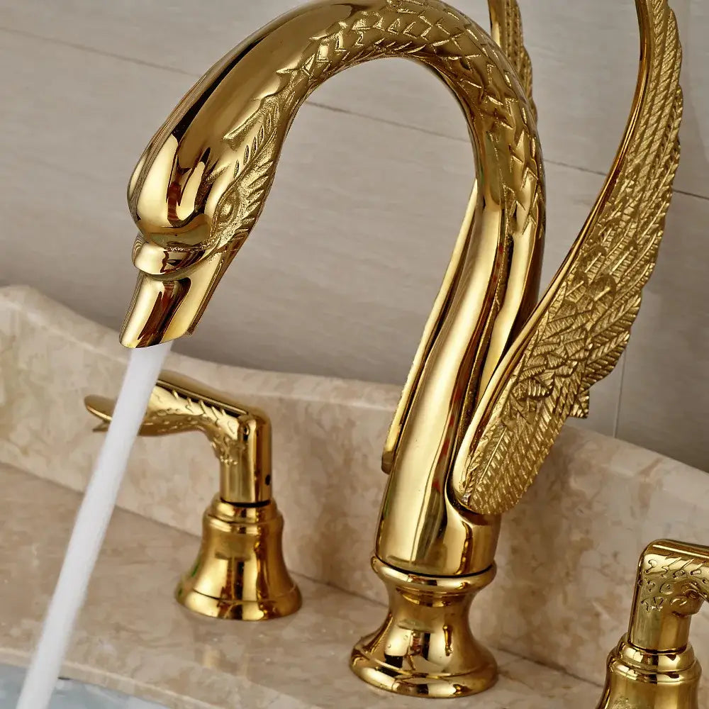 Luxury golden swan dual handle bathroom faucet with polished metallic finish and intricate feather detailing decorbites golden swan