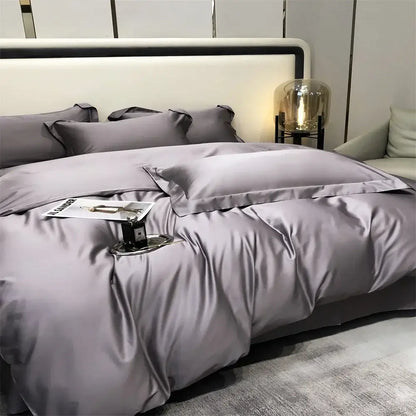 Luxurious gray satin egyptian cotton bedding set with matching pillows elegantly arranged on a modern bed