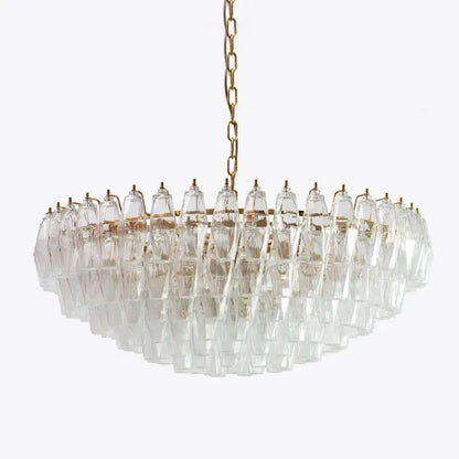 Luxury gray glass chandelier featuring clear crystal elements with gold-toned frame by Decorbites gray glass decor
