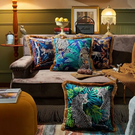 Luxury jungle animal collection cushion cover with vibrant leopard prints green foliage and gold fringe decorbites jungle animal