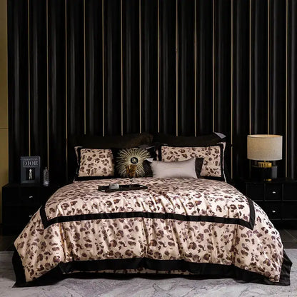 Cream-colored leopard print luxury bedding set with black satin trim and sunburst pillow by decorbites leopard print