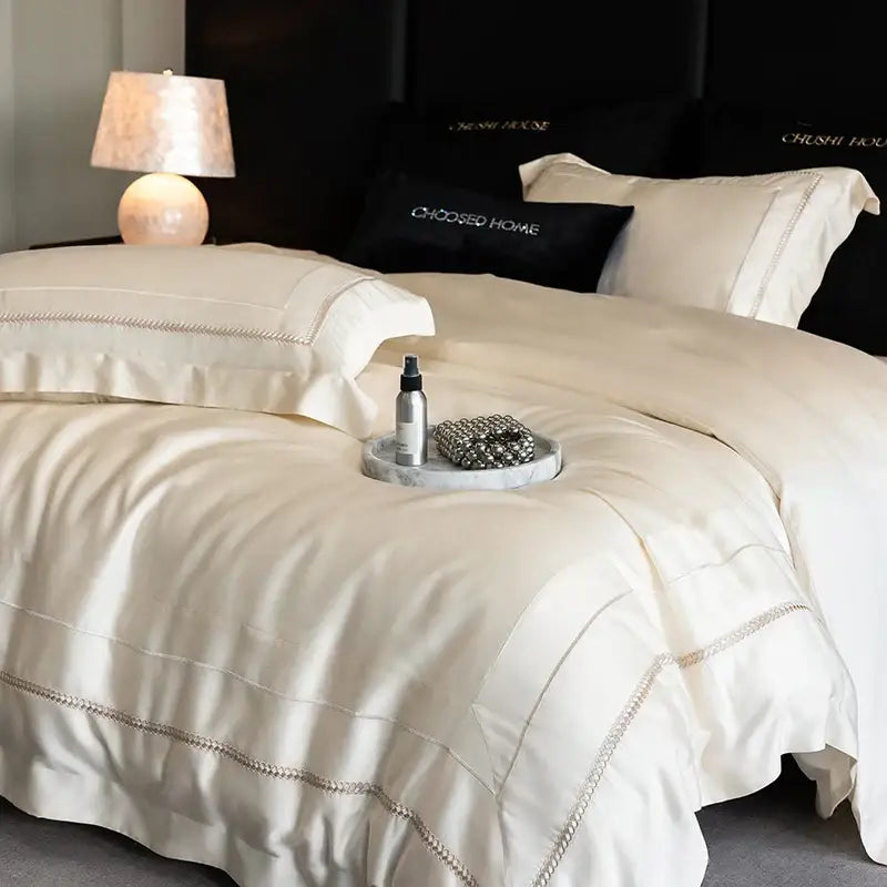 Cream-colored satin bedding set with silver-threaded embroidery edges light champagne luxury egyptian cotton decorbites