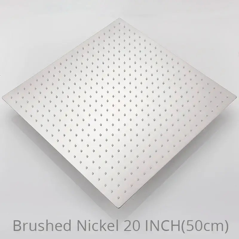 Brushed nickel square rainfall shower head with diamond-shaped perforations for a luxury shower experience