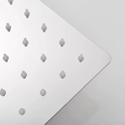 Polished chrome square rainfall shower head with rounded nozzles for a luxury matte black shower experience