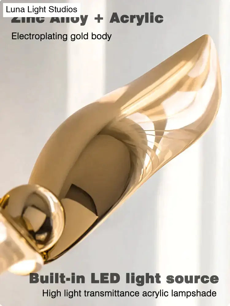 Luxury minimalist creative seagull wall lamp in gold electroplated zinc alloy and acrylic with sleek curved design