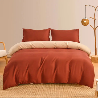Luxury rust-colored satin duvet cover set with cream inner lining and matching pillows for elegant bedroom bedding