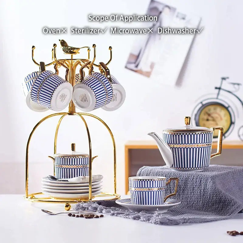 Blue and white striped porcelain teacup set with gold trim on a golden cup rack from decorbites gold porcelain collection