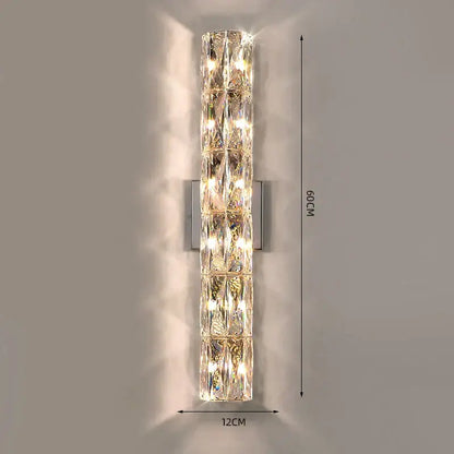 Luxury silver crystal deluxe wall sconce with clear faceted crystals and illuminated central column for living room decorbites