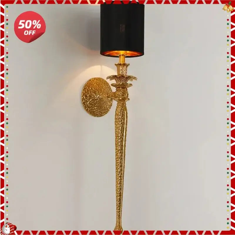 Luxury textured gold and black wall lamp with intricate design and black cylindrical shade perfect for decorbites copper wall decor
