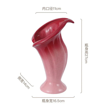 Glossy ceramic vase shaped like a calla lily with magenta gradient from deep red to soft pink for decorbites calla lily decor