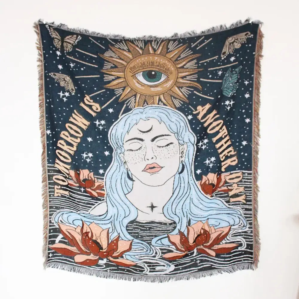 Dark blue woven mandala black geo tassel picnic mat and sofa cover featuring woman with light blue hair and lotus design
