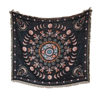 Black woven mandala geo tassel picnic mat and sofa cover featuring pink peach moon phases and teal floral motifs