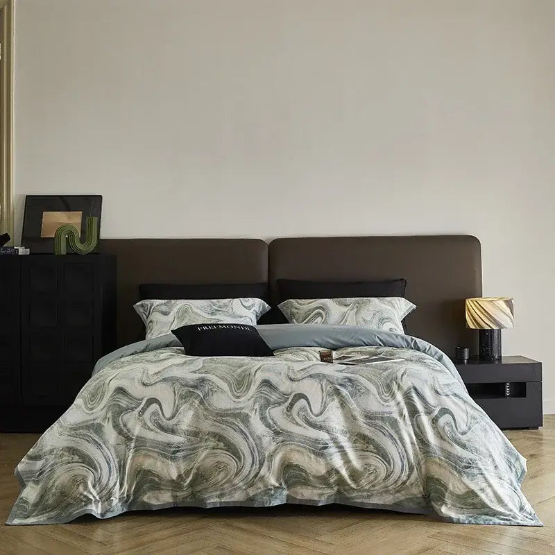 A luxurious marble gray and teal 100s egyptian cotton bedding set with a swirling marble pattern by decorbites