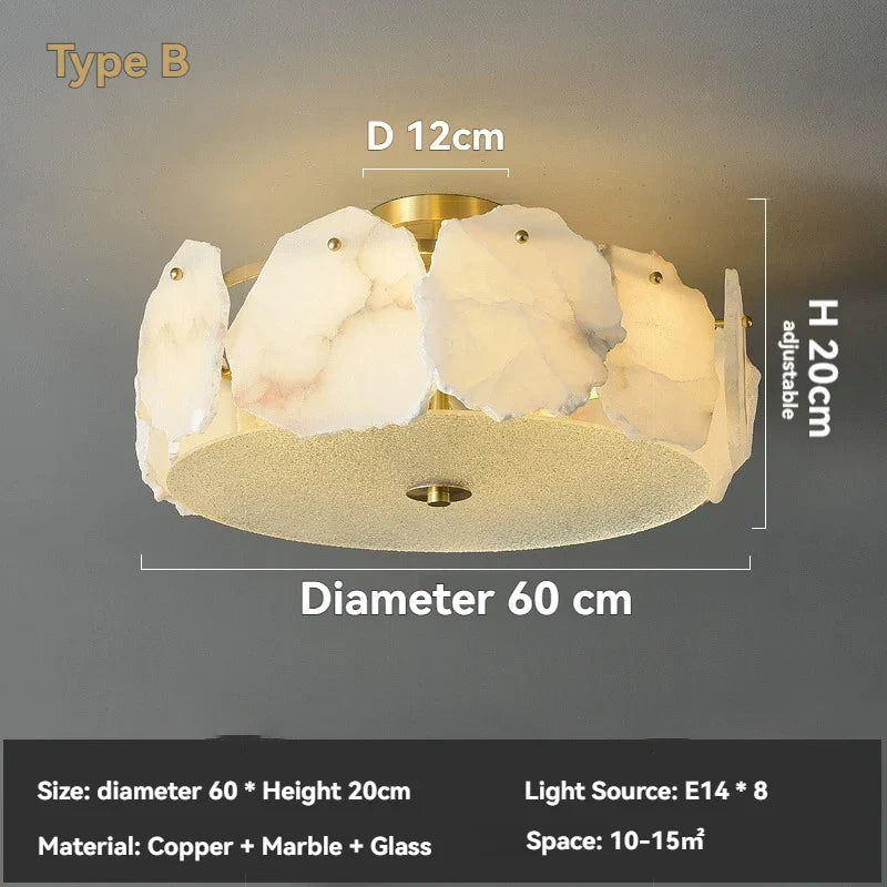 A modern pendant light marble led chandelier with brass base and white marble petal shades in a circular design