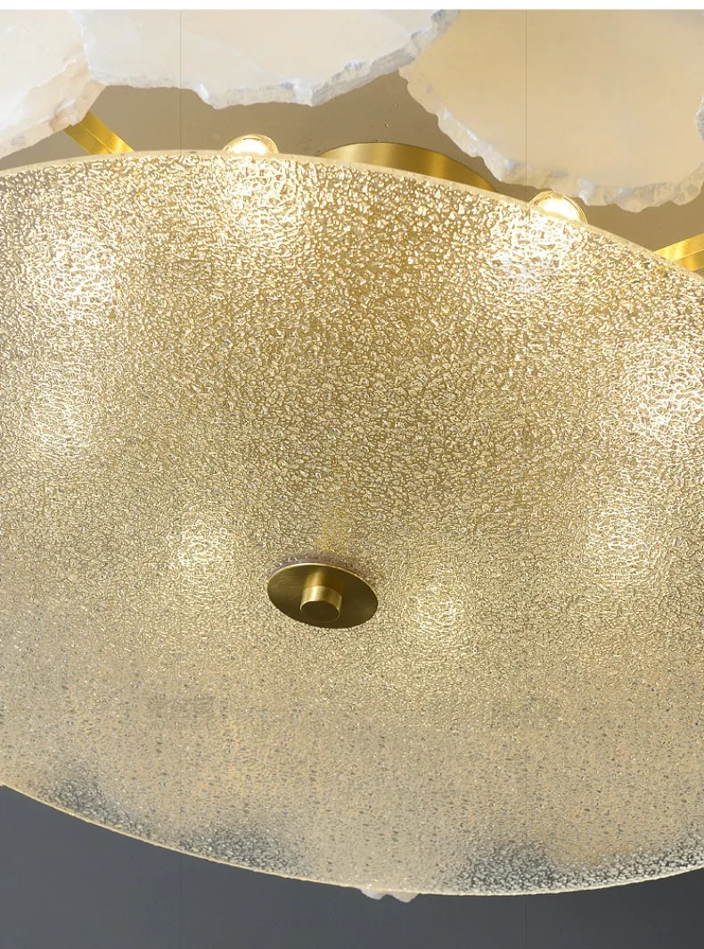 Gold-toned marble led chandelier round pendant light with textured frosted speckled glass and brass hardware