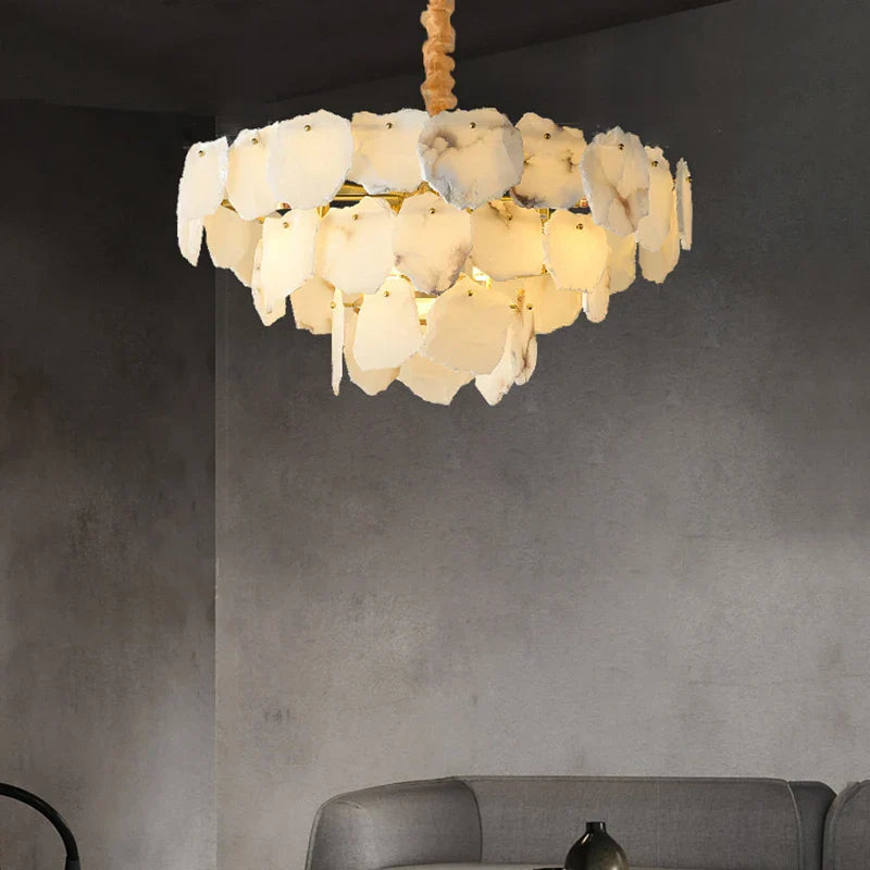 Marble led chandelier pendant light with layered irregular white stone plates suspended from twisted wooden cord
