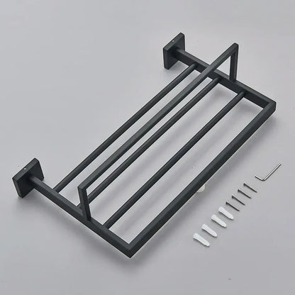 Matte black bathroom accessories set featuring a black matte-finished metal towel rack with four horizontal bars and wall mounts