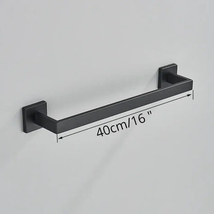 Matte black bathroom accessories set featuring a black matte-finished metal towel rack with square mounting plates