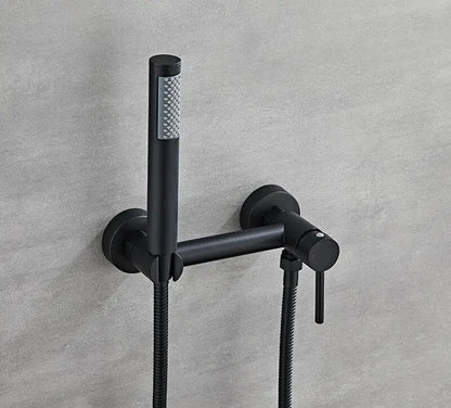 Matte black bidet faucet set with handheld sprayer featuring a sleek wall-mounted design and textured spray head