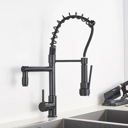 Black matte kitchen faucet with coiled flexible hose and swivel spout by decorbites brass kitchen collection