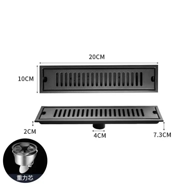 Matte black stainless steel strip floor drain with slotted design and integrated gravity siphon trap for bathroom shower