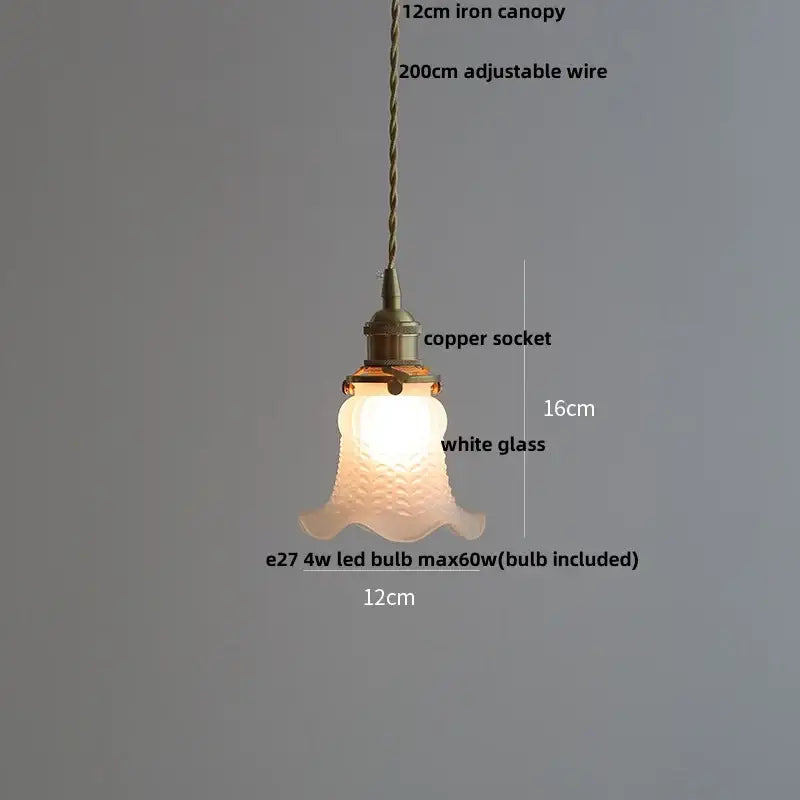 Matte brown and copper ceramic walnut pendant light with textured white glass bell shade and twisted iron canopy