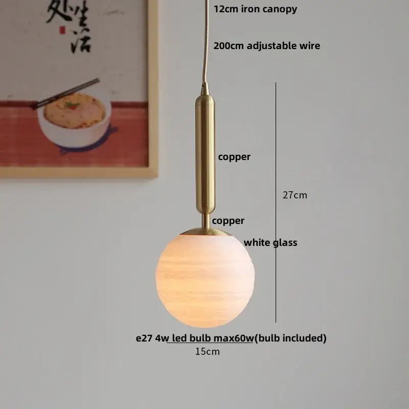 Matte brown and copper ceramic walnut pendant light with warm white glass globe and copper-finished metal decorbites ceramic walnut