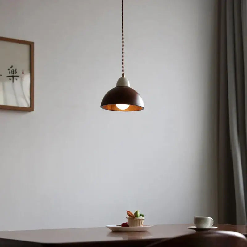 Matte brown and copper ceramic walnut pendant light with dark dome shade and braided cord for kitchen decorbites ceramic walnut